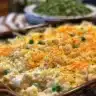 Delicious shredded chicken casserole served in a baking dish