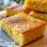 Deliciously soft and moist cornbread served in a rustic setting.