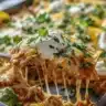 Plate of Sonora Chicken garnished with fresh herbs and spices