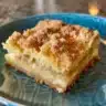 Sour Cream Coffee Cake topped with streusel, a perfect breakfast or dessert.