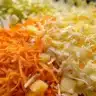 Tropical Pineapple Coleslaw with vibrant veggies and sweet pineapple in a bowl.
