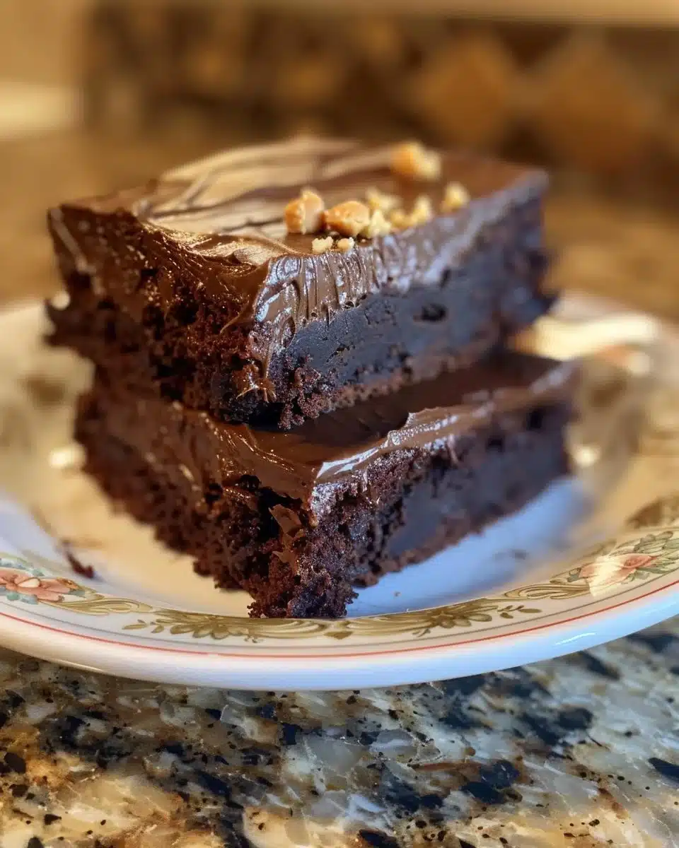Delicious Ultimate Snickers Cupcakes with caramel and chocolate frosting