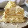 Moist yellow cake layered with creamy chocolate buttercream frosting
