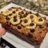 Sliced almond flour banana bread on a wooden board