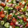Delicious amazing salad with fresh vegetables and vibrant colors