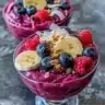 Homemade acai bowl topped with fresh fruits and granola