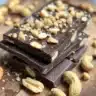 Banana bites with chocolate and peanut butter on a plate
