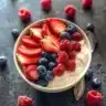 Berry-filled frozen yogurt bites on a white plate