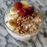 Bowl of Chai Latte Overnight Oats topped with spices and fruits