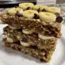 Freshly baked chocolate chip banana oatmeal cookies on a cooling rack