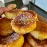 Delicious churro waffles topped with cinnamon sugar and chocolate sauce