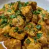 Creamy Chicken Tikka Masala served in a bowl with cilantro garnish.