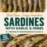 Crispy Mediterranean sardines with garlic and herbs served on a platter
