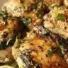 Plate of easy cilantro lime chicken garnished with fresh cilantro