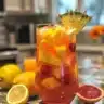 Colorful celebration punch served in glasses for a festive gathering.