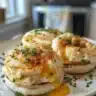 Luxurious Eggs Benedict with crab and caviar plated beautifully