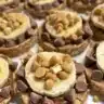 Frozen banana bites covered in chocolate and peanut butter for a tasty treat