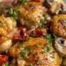 Delicious Garlic Mushroom Chicken Thighs served on a plate with herbs garnish.