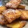 Delicious grain-free French crêpes served with fruit and syrup