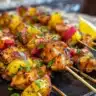 Grilled fish tacos with citrus slaw and Chilean sea bass on a platter.