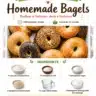 Freshly baked homemade bagels topped with sesame seeds on a wooden table