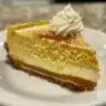 Delicious Keto Pumpkin Cheesecake Mousse topped with whipped cream and cinnamon