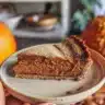 Keto-friendly pumpkin waffles topped with syrup and spices