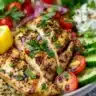 Lemon Herb Greek Chicken Bowl with fresh vegetables and herbs