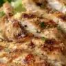 Delicious low-carb garlic chicken wraps with melted cheese on a plate.