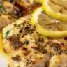 Mediterranean Greek chicken marinade in a bowl with herbs and spices