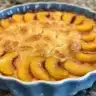 Delicious mini peach cobbler served in ramekin.