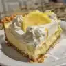 No-bake lemon cream cheese pie with a graham cracker crust and lemon zest