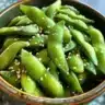 Bowl of sesame-salted edamame, a healthy protein-rich snack.