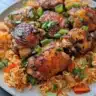 Delicious Skillet Chicken served with seasoned rice in a skillet dish