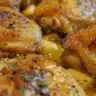 Sticky Apple Cider Chicken with a sweet glaze on a serving plate