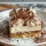 Elegant tiramisu in a glass served with cocoa dusting