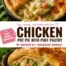 Chicken pot pie with puff pastry crust and creamy filling on a rustic table