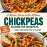 A bowl of cooked chickpeas with fresh herbs and spices for a flavorful dish.
