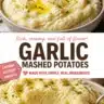 Bowl of creamy garlic mashed potatoes topped with fresh herbs